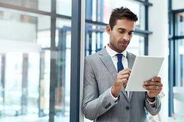 Fototapeta premium Corporate, planning and tablet with business man in office, reading information online for research. App, internet and networking with confident employee in professional workplace for administration