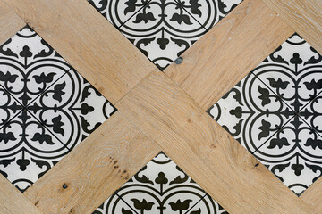 Geometric-Patterned Tile Flooring Combined With Light Wood In Trendy Design
