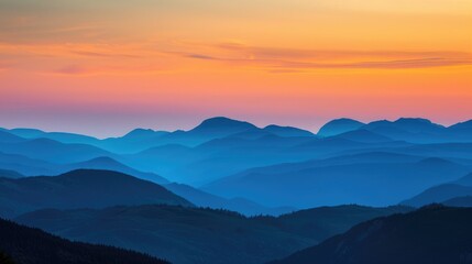 Fototapeta premium Variation of hues in evening sky over mountain layers