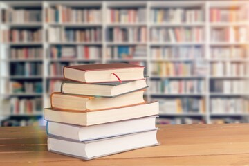 stack of reading books at library background