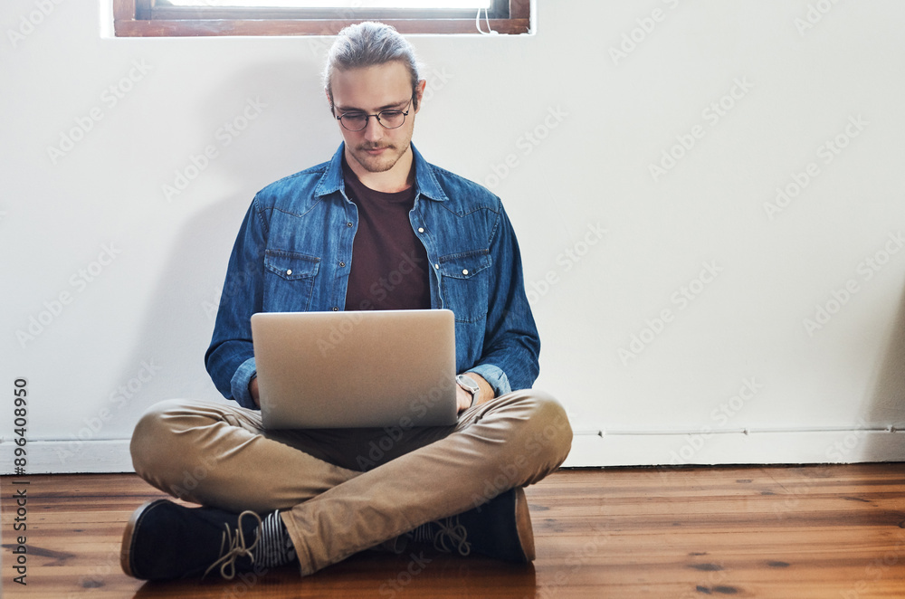 Poster Business, office and man with laptop on floor for programming, research and information in IT. Company, developer and person with tech at work for software development, report and upgrade of system