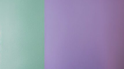 Obraz premium Beautiful two-tone pastel green and purple wall, perfect for minimalist designs, with a modern and geometric backdrop for creativity