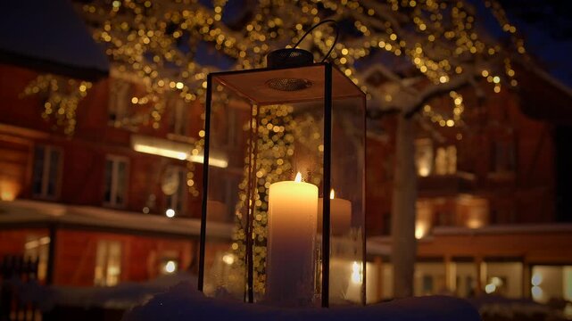 Create a cozy winter outdoor setting with a candle lantern and twinkling lights for a relaxing vibe