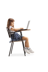 Kid sitting in a school chair and using a laptop computer