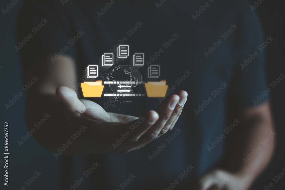 Leinwandbilder man hand transferring files in virtual screen for send of document on internet. data transfer, trans