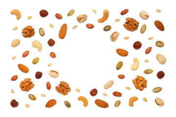 Background from various circle shaped nuts and seeds with copy space for text. Isolated on white background. Flat lay, top view