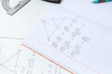 Copybooks with math formulas, closeup