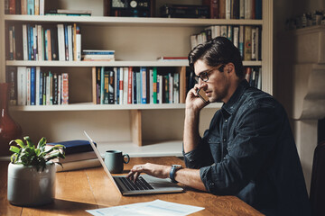 Phone call, laptop and business man at desk for conversation, project feedback or schedule meeting. Remote work, contact and person talking on mobile for planning, advice or consulting in home office