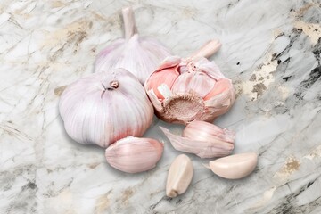 Ripe Garlic cloves on desk background