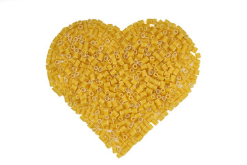 Pasta in the shape of a heart on a white background.