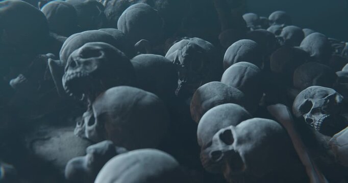 War concept, Bunch of Bones Human Skulls scattering and  covering dusty ground, death and extinction conceptual background