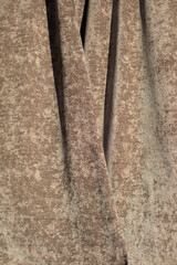 Texture of fabric is brown. Velvety fabric. Curtain of elegant style.