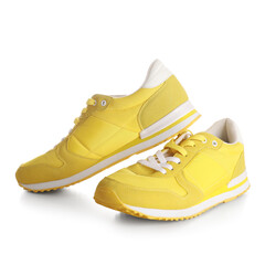 Stylish male yellow sneakers on white background