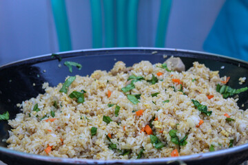 Fried rice in a large skillet