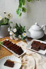 Kek Buah Kukus, a traditional Malaysian steamed fruit cake filled with dried fruits, nuts, and spices