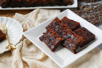 Kek Buah Kukus, a traditional Malaysian steamed fruit cake filled with dried fruits, nuts, and spices