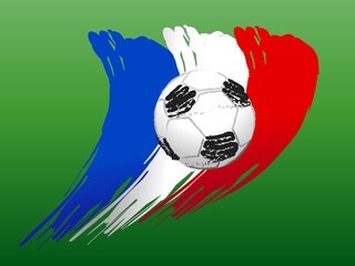 A soccer ball on the background of the French flag. Green background.