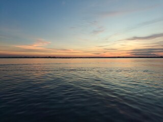 Tranquil lake water and the beautiful sky at Twilight