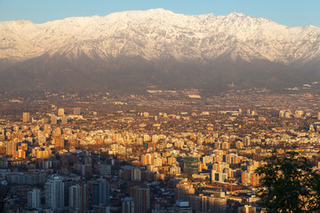 Naklejka premium View of Santiago de Chile with Andes Covered with Snow