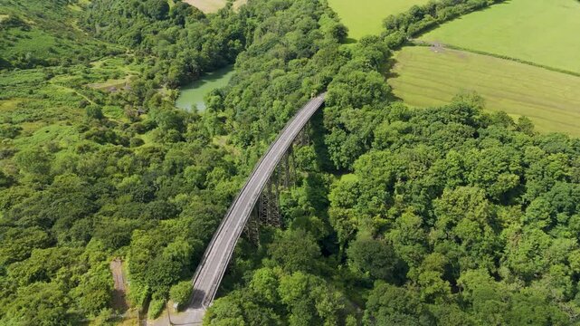 Aerial view of Meldon Viaduct and Okement Valley, showcasing the picturesque landscape and historic bridge