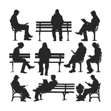 Silhouettes of people sitting on a park bench, reading.