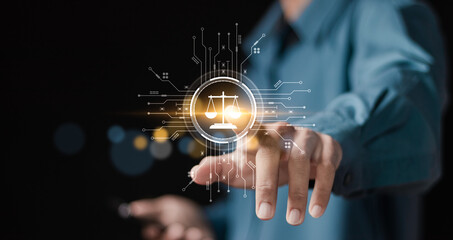 Justice and laws concept. AI ethics or AI law, developing AI codes of ethics. Compliance, regulation, standard and business policy. businessman touching law technology symbol on virtual screen.