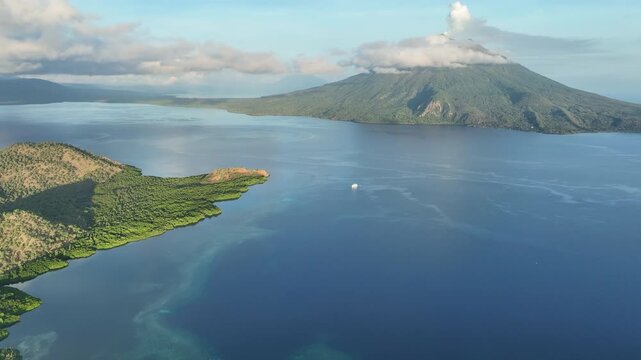 Morning light illuminates the scenic island of Pulau Lembata, between Alor and Flores, Indonesia. This beautiful and biodiverse area is part of the famed Ring of Fire and is volcanically active.
