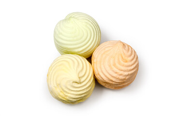 Marshmallow on a white background. Three multi-colored marshmallows. Sweet confectionery.
