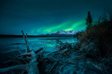 Northern lights in the sky over Alaska foreground