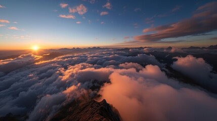 Sunset above the clouds in the Alps mountains, showcasing a vibrant and breathtaking panorama with orange and pink hues