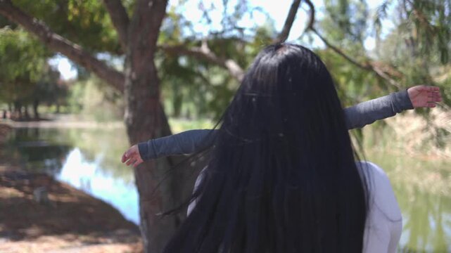 Mexican mother having fun with her son outdoors