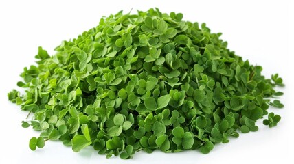 Obraz premium Fresh green clover leaves piled together, perfect for presentations on nature, health, and organic farming.