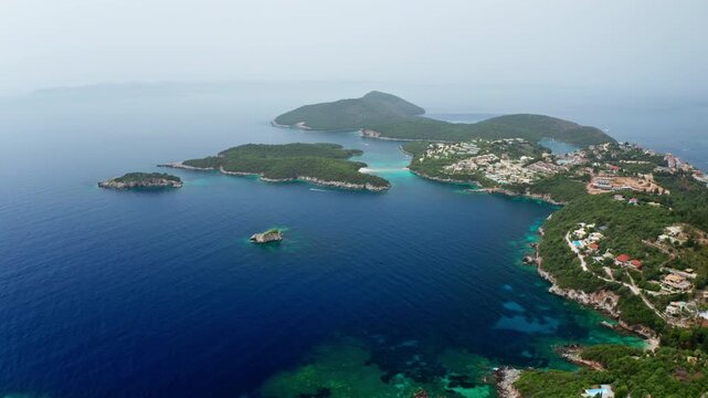 Aerial drone view of the Preveza coastline in the Epirus region in Greece. High view of the exotic Alonaki beach and other small beaches in the distance close to Parga.