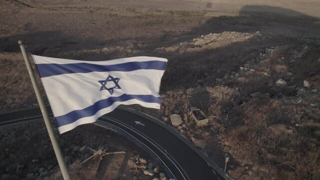 The Israeli flag found on a volcano where they built a bunker with large combat equipment, the site of one of the most critical battles of the Yom Kippur War on 1973 (D-log)