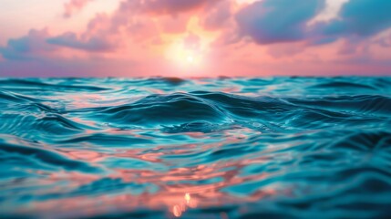 Ocean waves at sunset with colorful sky and clouds, tranquil seascape. Nature and tranquility concept