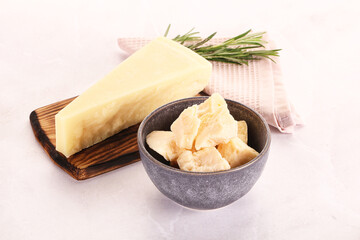 Chopped Italian hard parmesan cheese