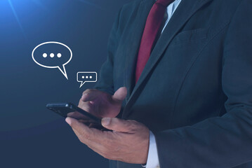 Man's hand typing on mobile smartphone, Live Chat Chatting on application Communication Digital Web. Social media and digital online concept, Social Distancing, Working From Home concept.