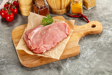 Raw pork schnitzel for cooking