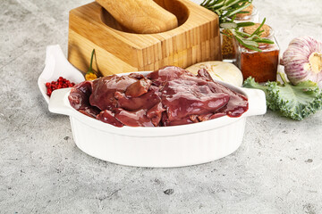 Raw uncooked chicken liver in the bowl