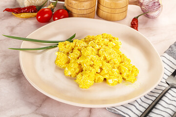 Scrambled egg in the bowl