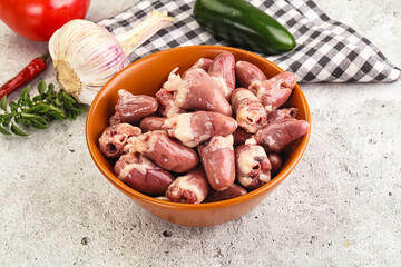 Fresh raw chicken hearts in the bowl