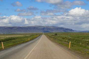 Road in the south of Iceland, on a summer day with blue sky