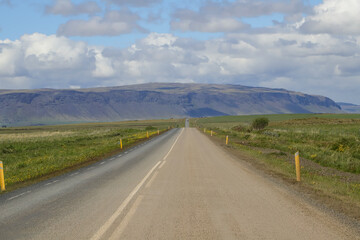 Road in the south of Iceland, on a summer day with blue sky