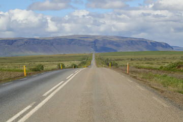 Road in the south of Iceland, on a summer day with blue sky