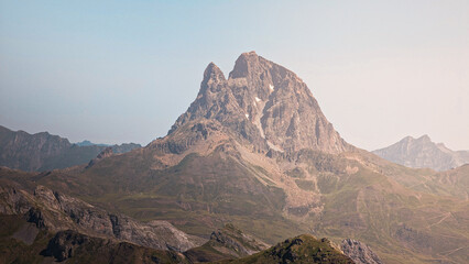 Stunning landscape of Formigal with Pico Midi d'Ossau dominating the horizon, highlighting the...