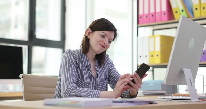 Office worker sleeps in office oblivious to ringing phone