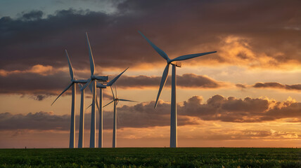 Obraz premium wind farm in the sunset, ai generated