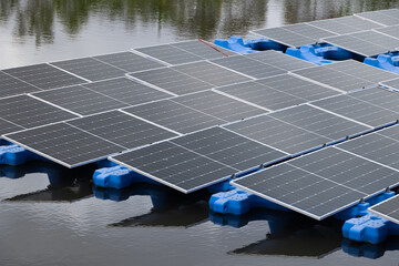 Floating Solar Panel. Solar photovoltaic panel PV System in Industry lake water pond. Saving Energy...