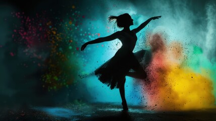 Graceful Ballet Dancer Performing Amidst Colorful Powder Explosion in Dramatic Lighting