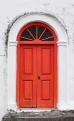 An arched door with a simple shape in front view on a white background in high definition.